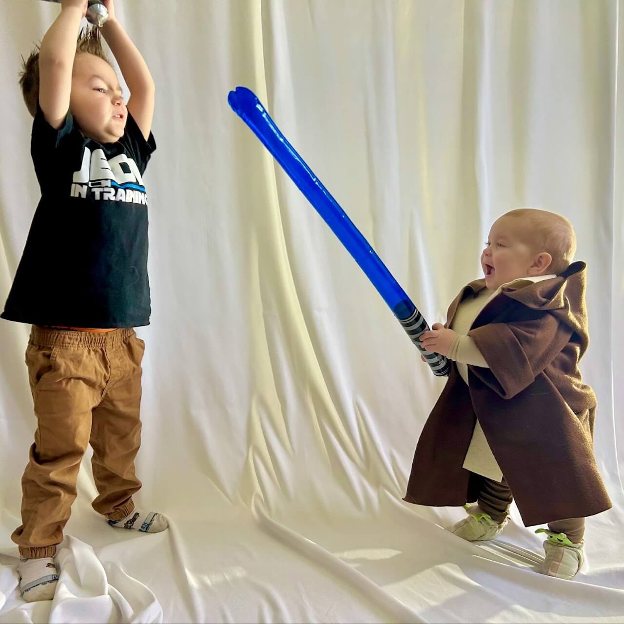 Young Jedi in playful duel